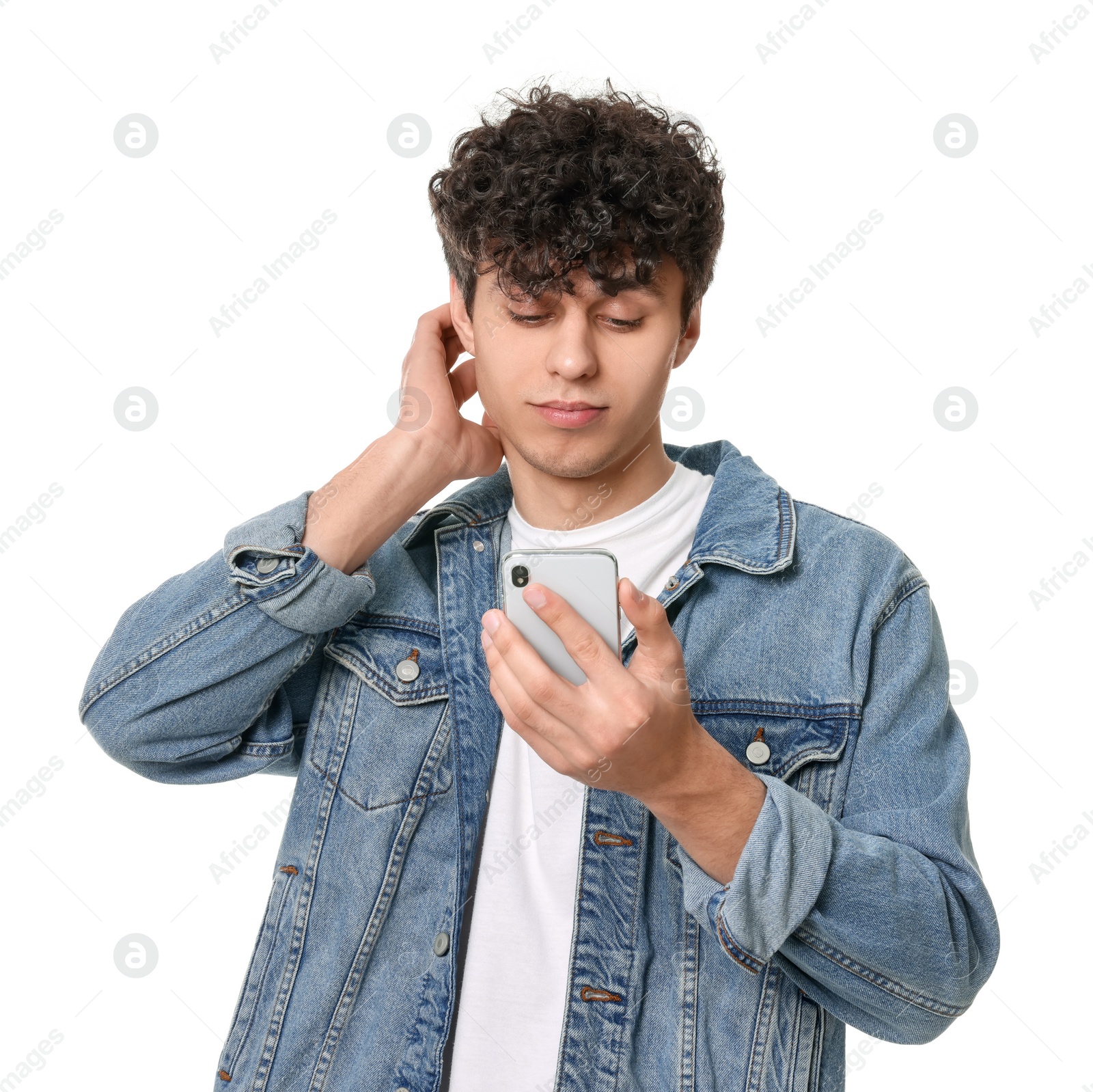 Photo of Handsome young man using smartphone on white background