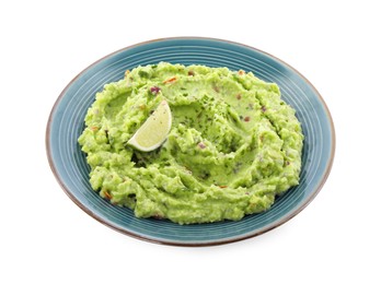 Photo of Delicious guacamole served with lime isolated on white