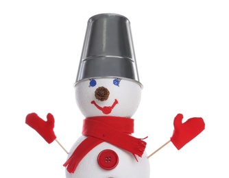 Photo of Decorative snowman with bucket, red scarf and mittens isolated on white