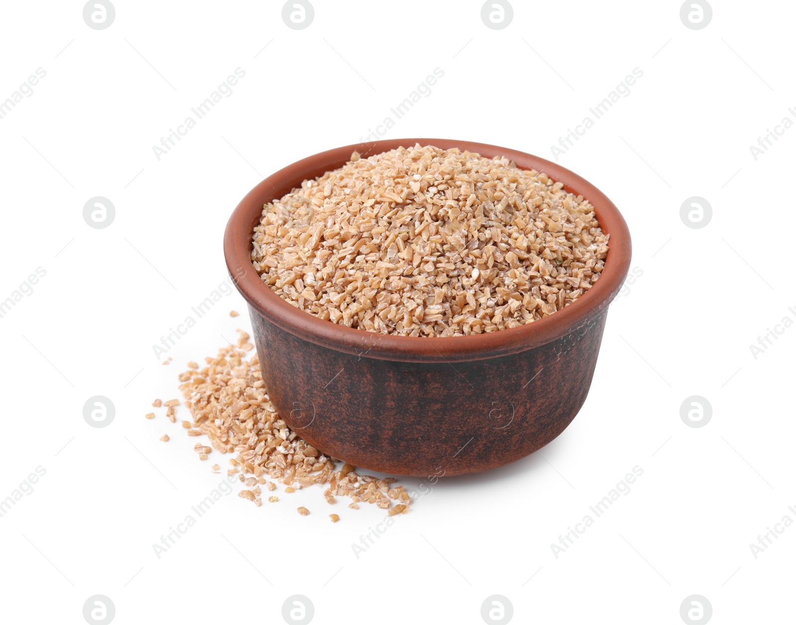 Photo of Dry wheat groats in bowl isolated on white