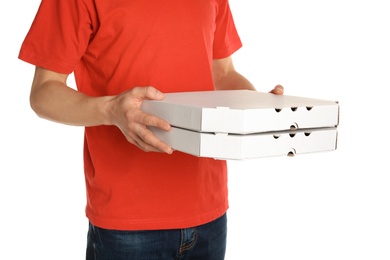 Photo of Young man with pizza boxes on white background. Food delivery service