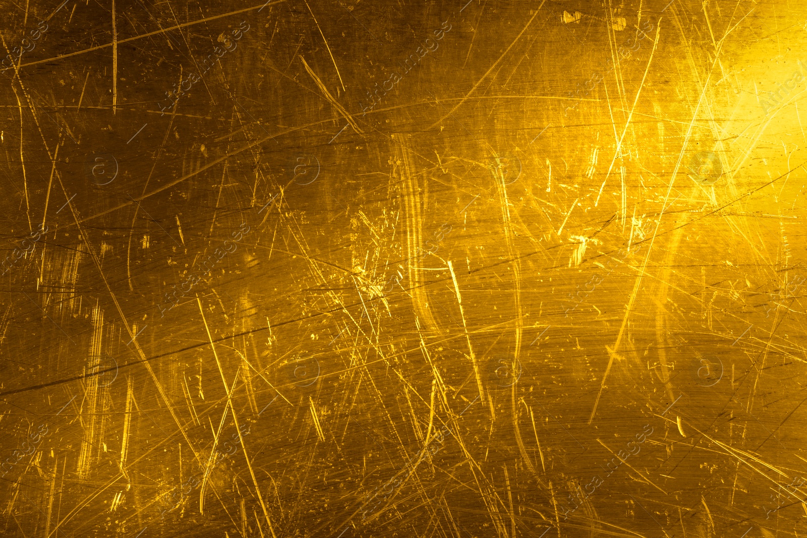 Image of Golden textured surface as background, closeup view