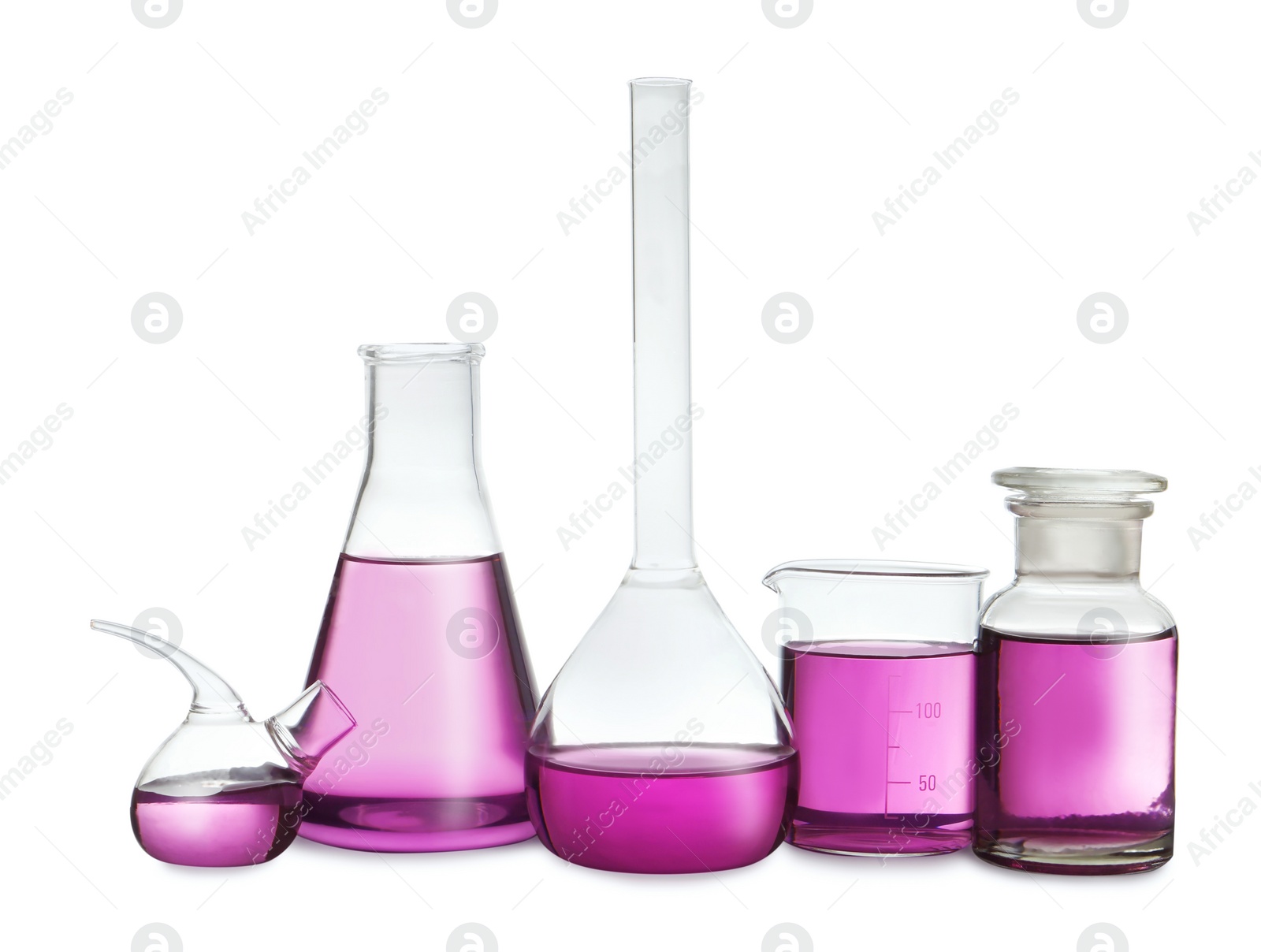 Photo of Laboratory glassware with purple liquid on white background