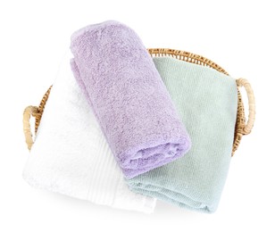 Photo of Basket with different soft towels isolated on white, top view