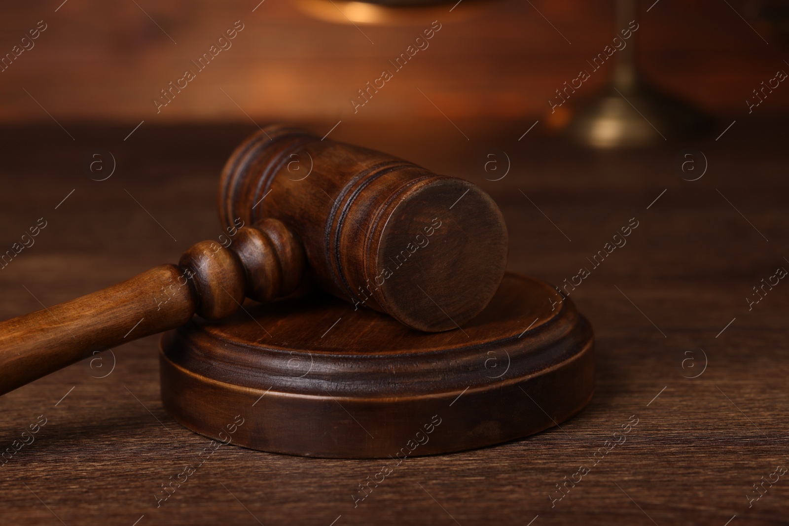 Photo of Law concept. Judge's gavel on wooden table, closeup