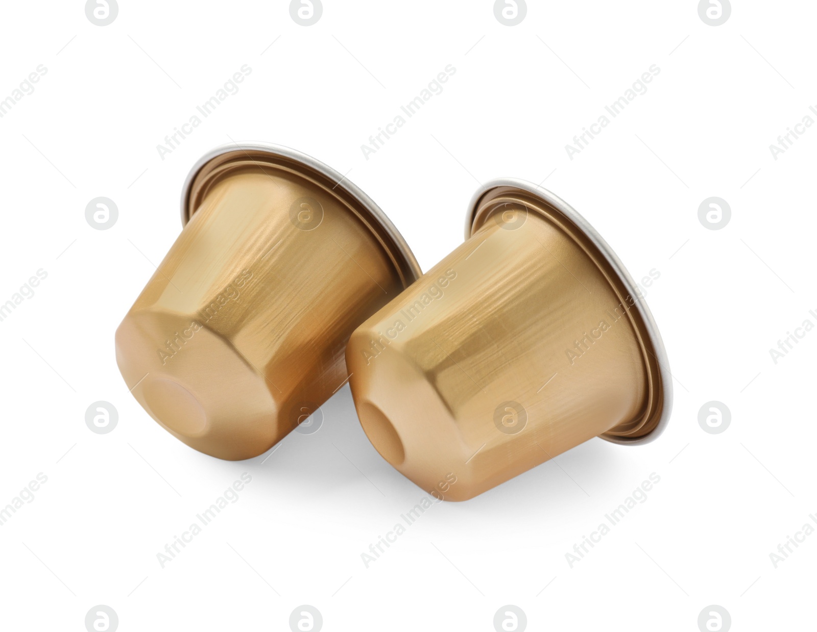 Photo of Two plastic coffee capsules isolated on white