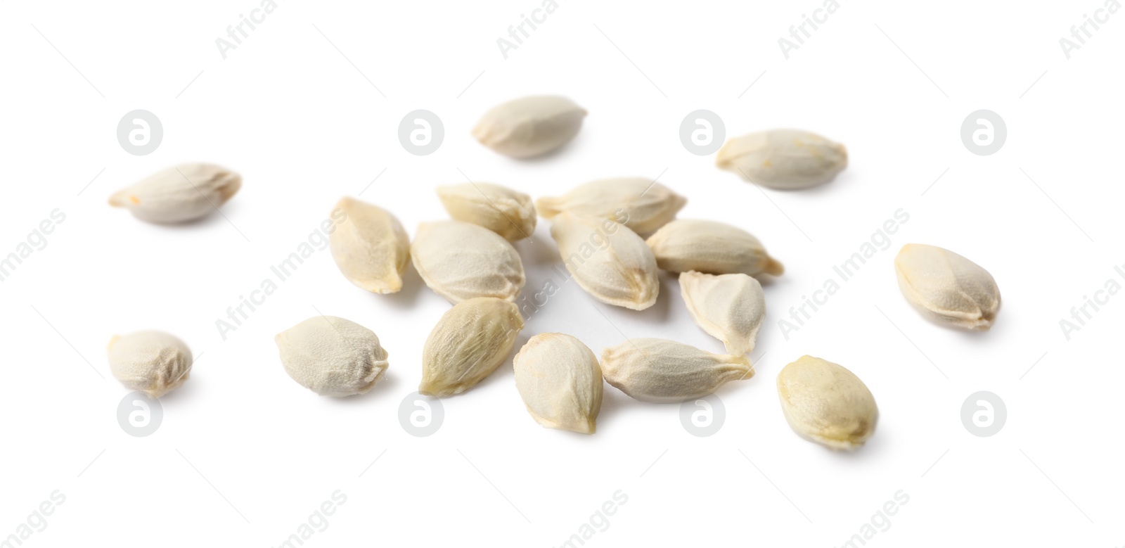 Photo of Many seeds of tangerine isolated on white