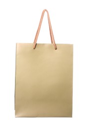 Photo of One brown shopping bag isolated on white