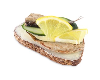 Photo of Delicious sandwich with smoked sprats, cucumber and lemon isolated on white