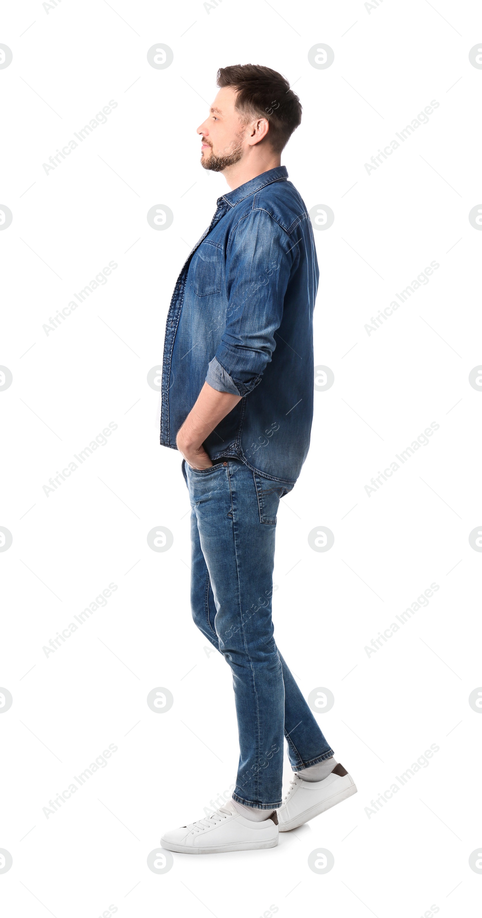 Photo of Full length portrait of handsome man posing on white background