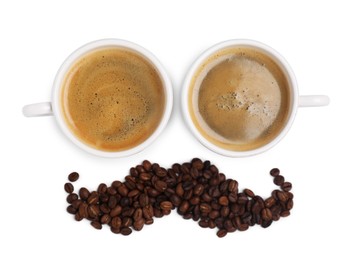 Photo of Face made with cups of coffee as eyes and beans as mustache on white background, top view