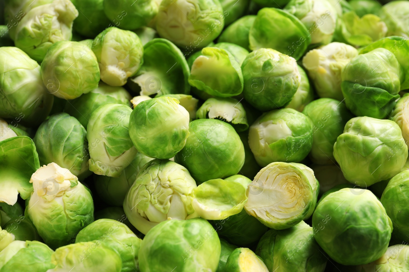 Photo of Tasty fresh Brussels sprouts as background, closeup