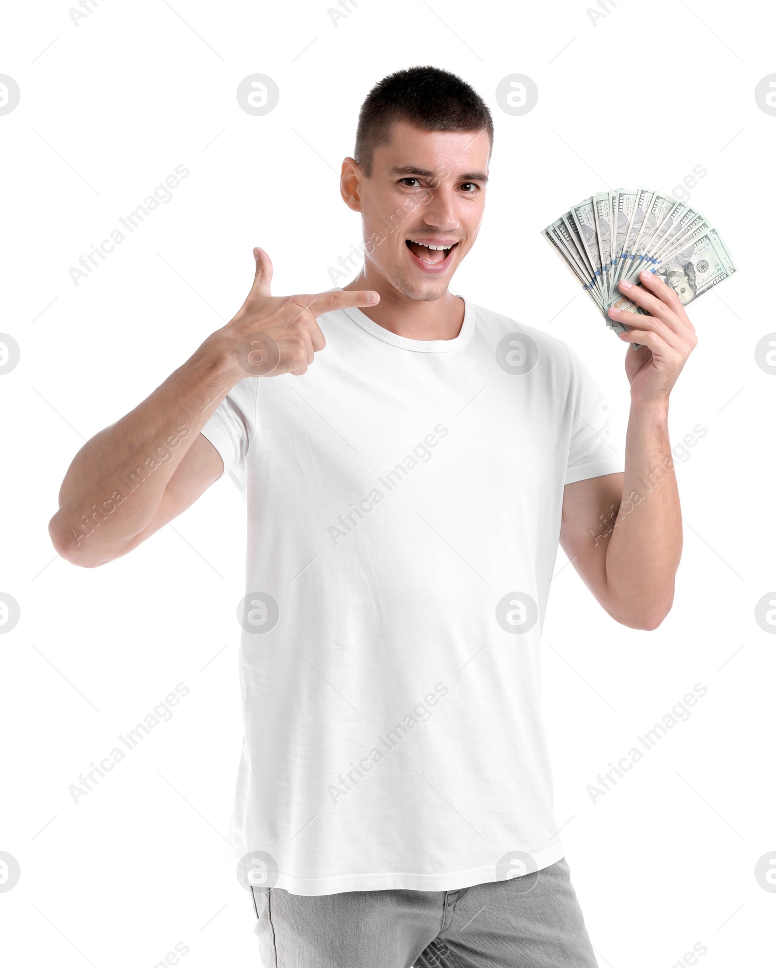 Photo of Handsome young man with dollars on white background