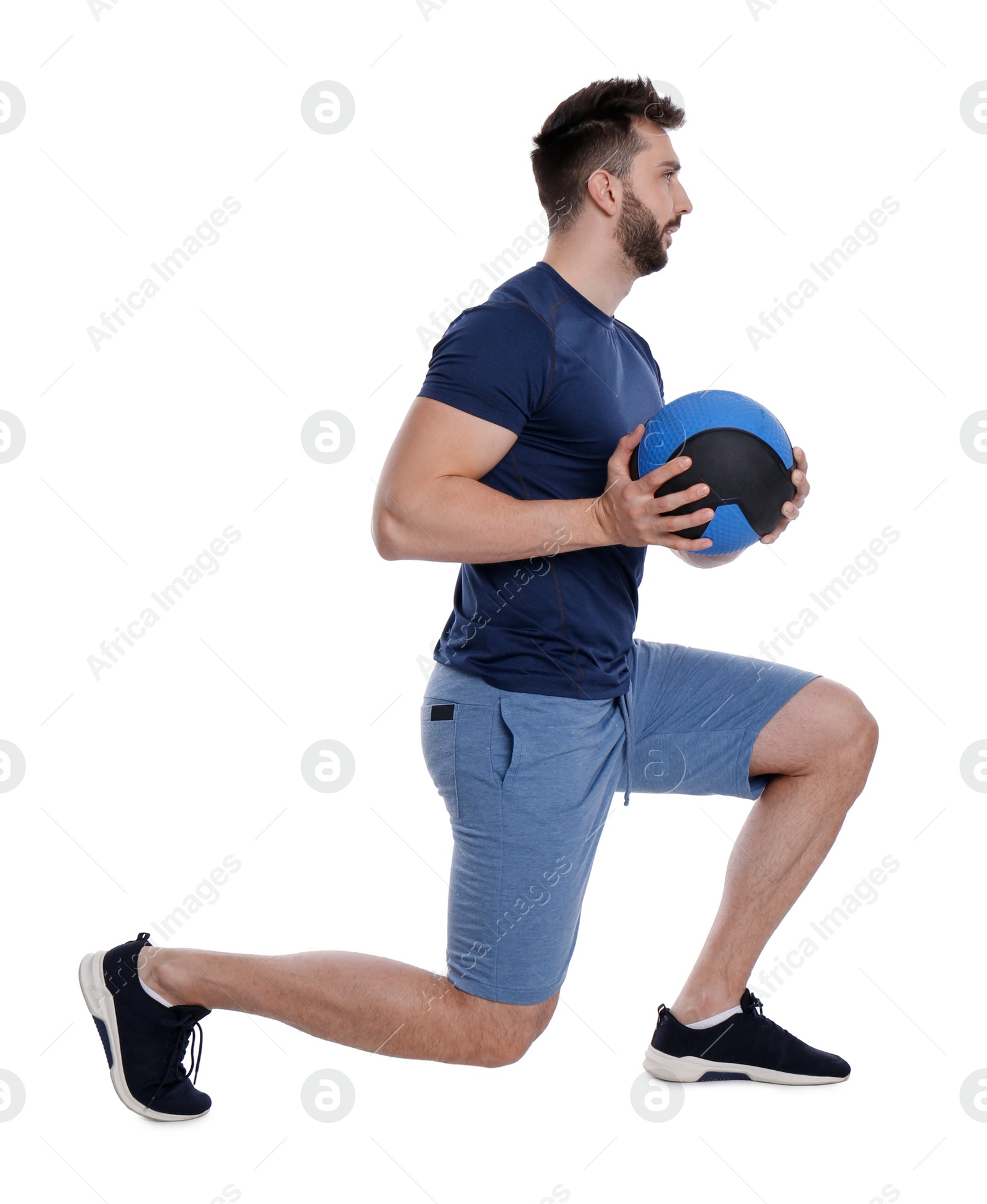 Photo of Athletic man doing exercise with medicine ball isolated on white