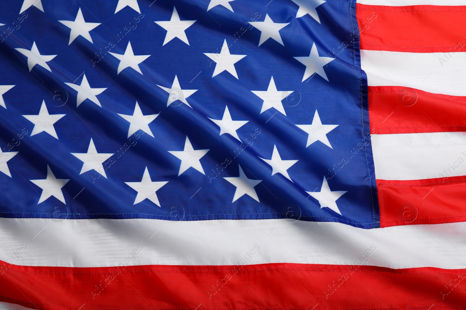 Photo of American flag as background, top view. National symbol of USA