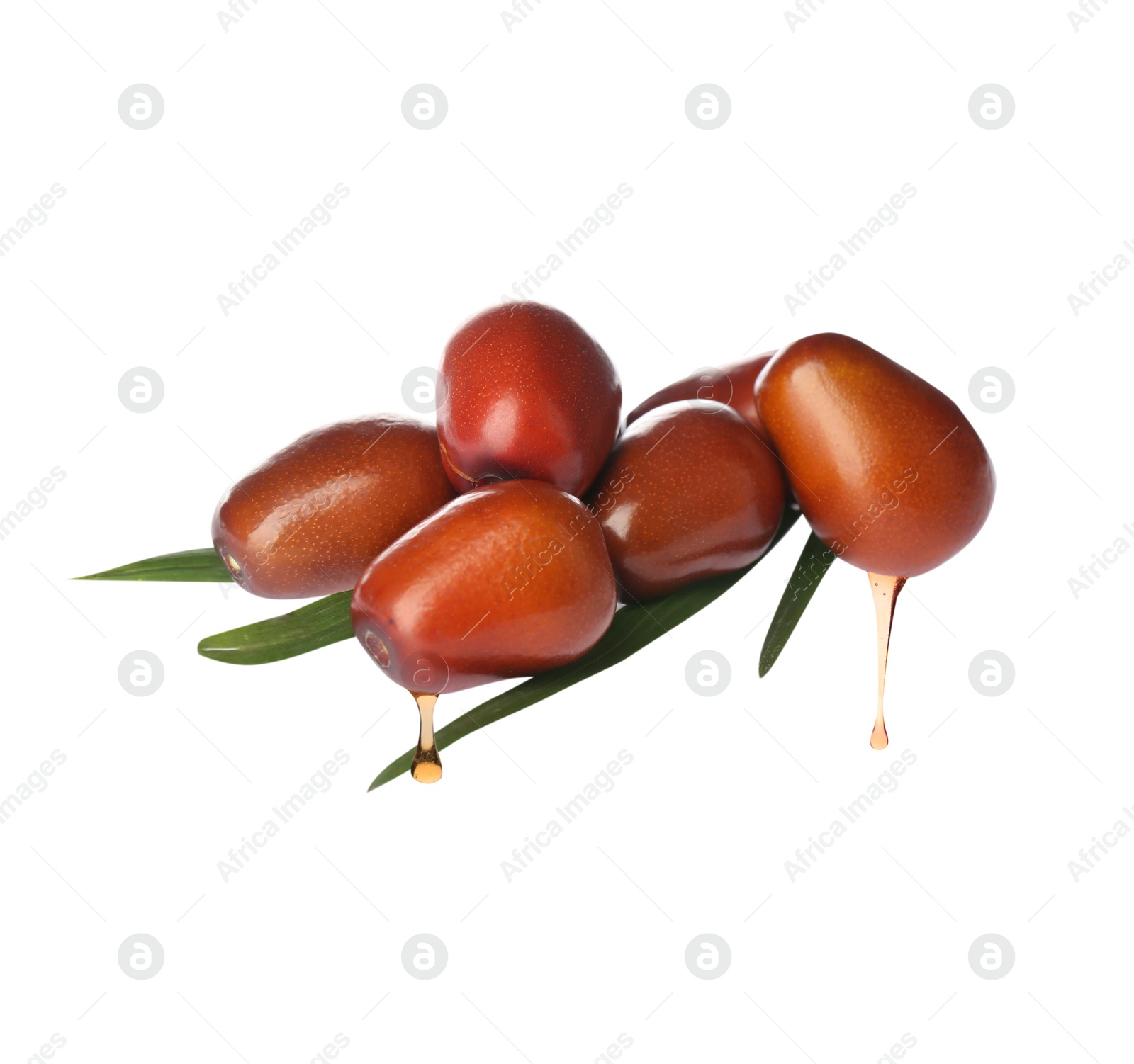 Image of Oil dripping from palm fruits on white background