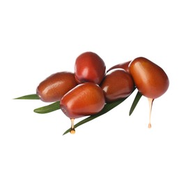 Image of Oil dripping from palm fruits on white background