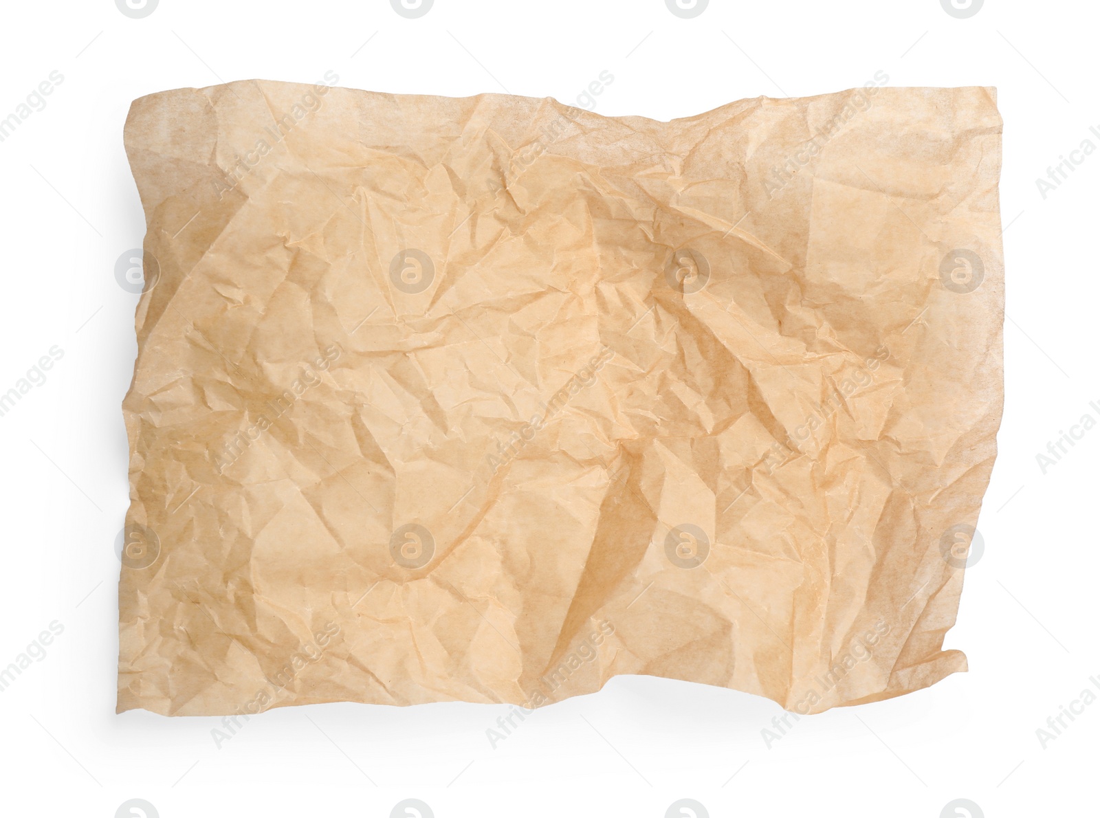 Photo of Sheet of crumpled brown baking paper on white background, top view