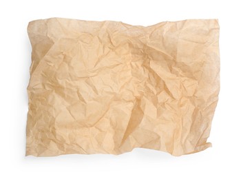 Photo of Sheet of crumpled brown baking paper on white background, top view