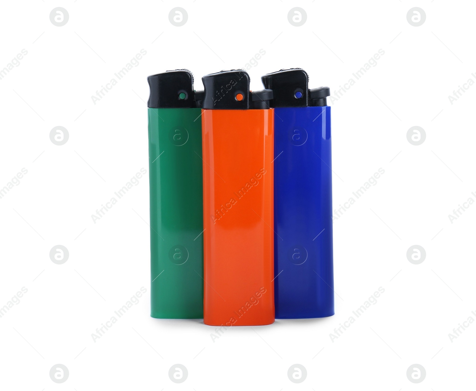 Photo of Stylish small pocket lighters on white background