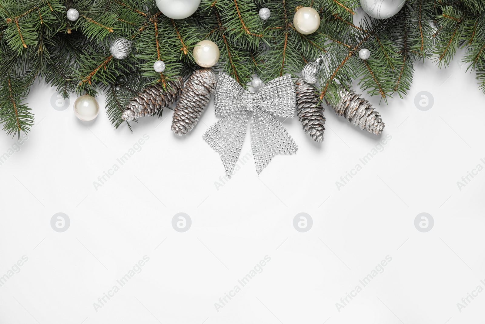 Photo of Christmas decoration on white background, top view. Space for text