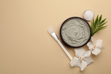 Photo of Flat lay composition with cosmetic product on beige background, space for text. Spa body wraps
