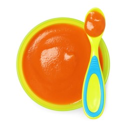 Photo of Delicious baby food in bowl and spoon isolated on white, top view