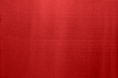 Image of Beautiful red foil as background, top view
