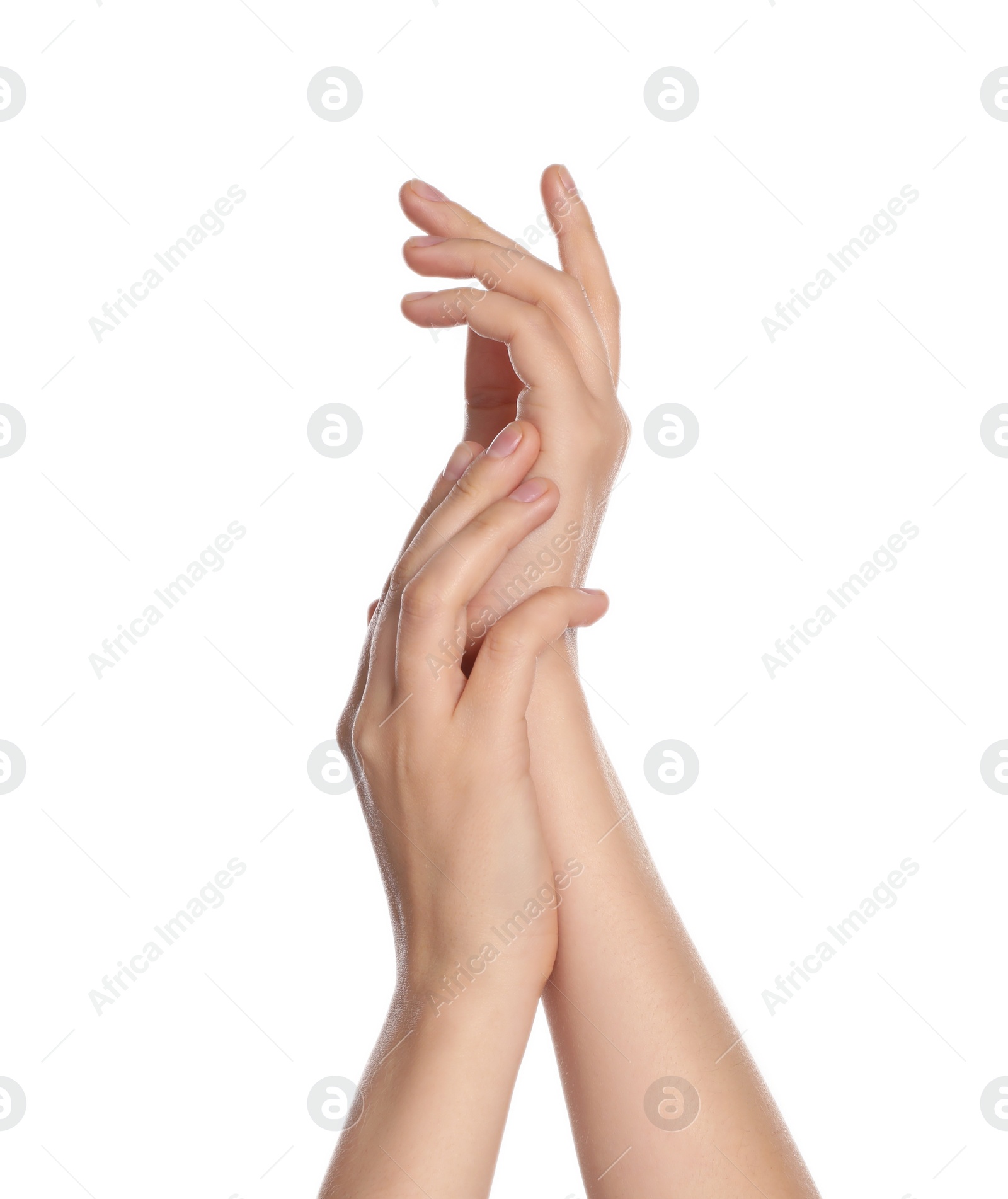 Photo of Woman applying cream on hand against white background, closeup