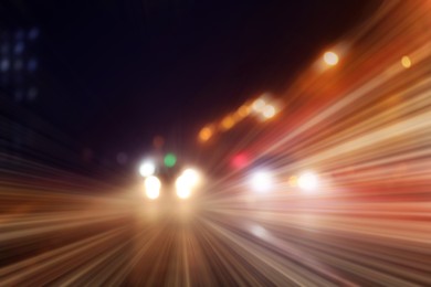 Image of Road traffic, motion blur effect. View of car light trails at night
