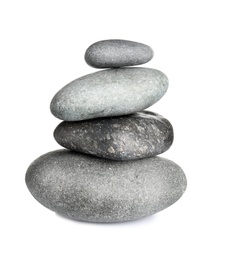 Stack of zen spa stones on white background