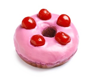 Photo of Sweet delicious glazed donut decorated with berries on white background