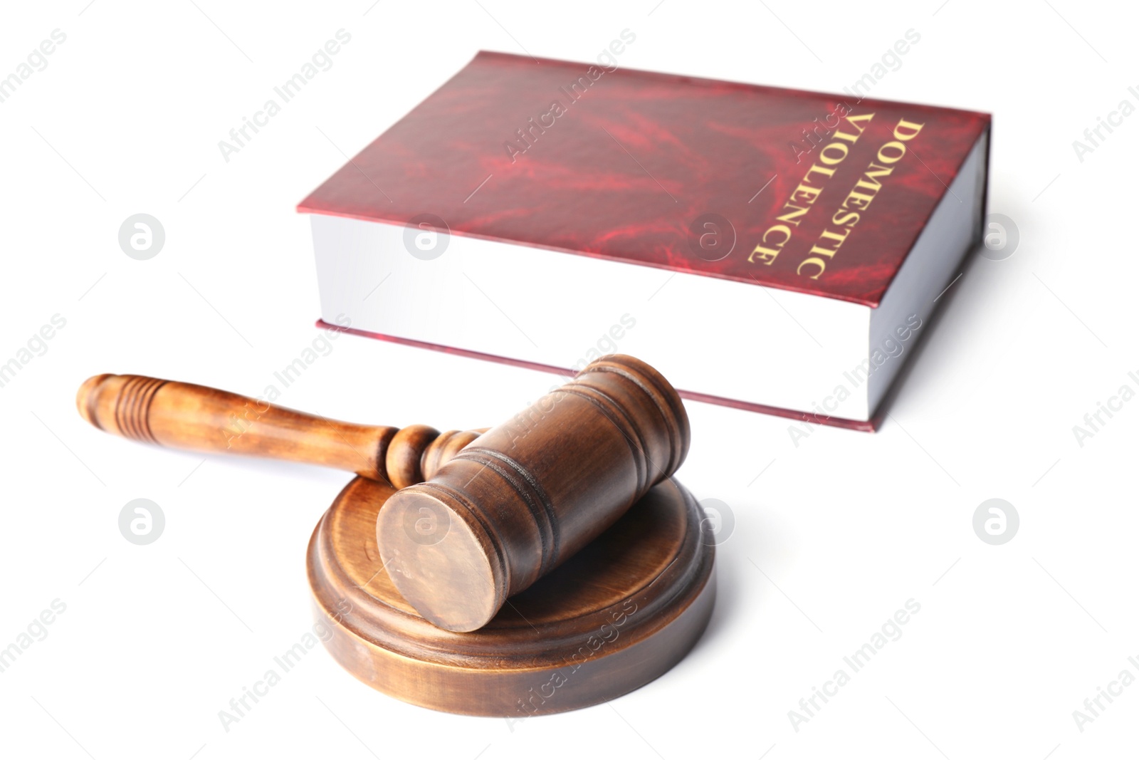 Photo of Domestic violence law book and wooden gavel on white background