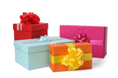 Photo of Colorful gift boxes with bows on white background