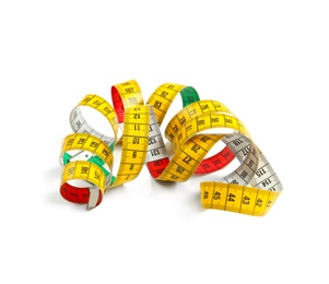 Photo of Measuring tape on white background