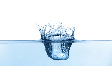 Photo of Splash of pure water on white background, closeup