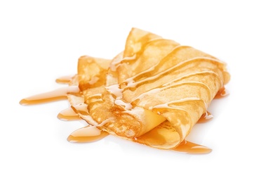 Tasty thin pancake with maple syrup on white background
