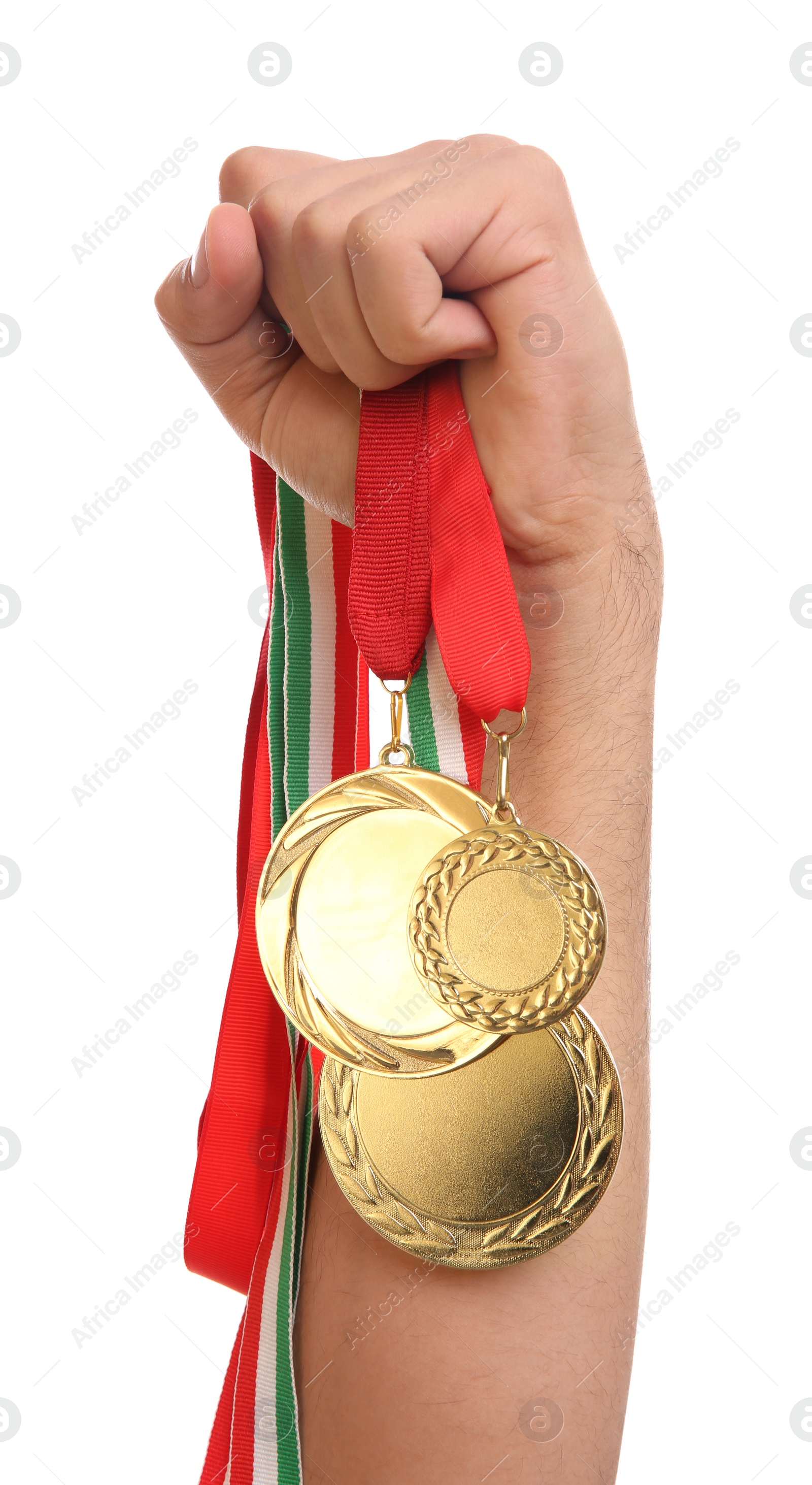 Photo of Man holding golden medals on white background, closeup. Space for design