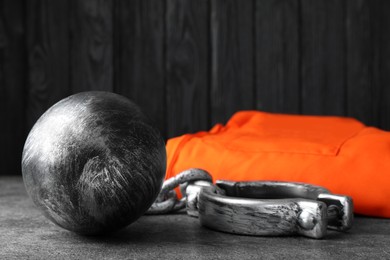 Photo of Prisoner ball with chain on grey table