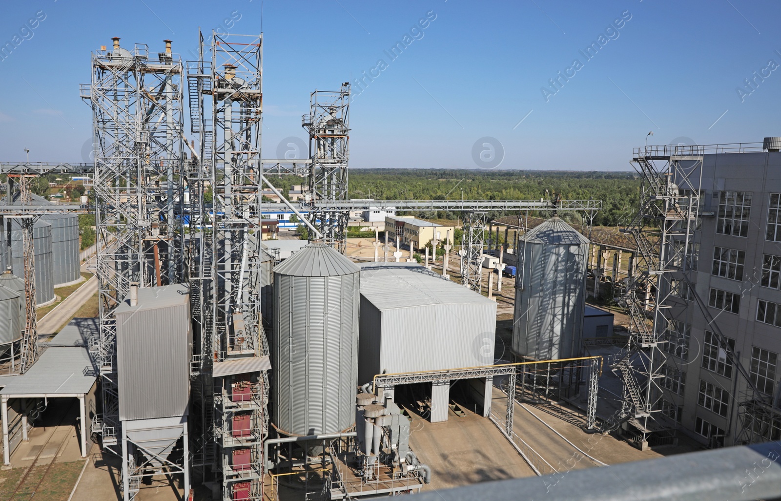 Photo of View of modern granaries for storing cereal grains outdoors