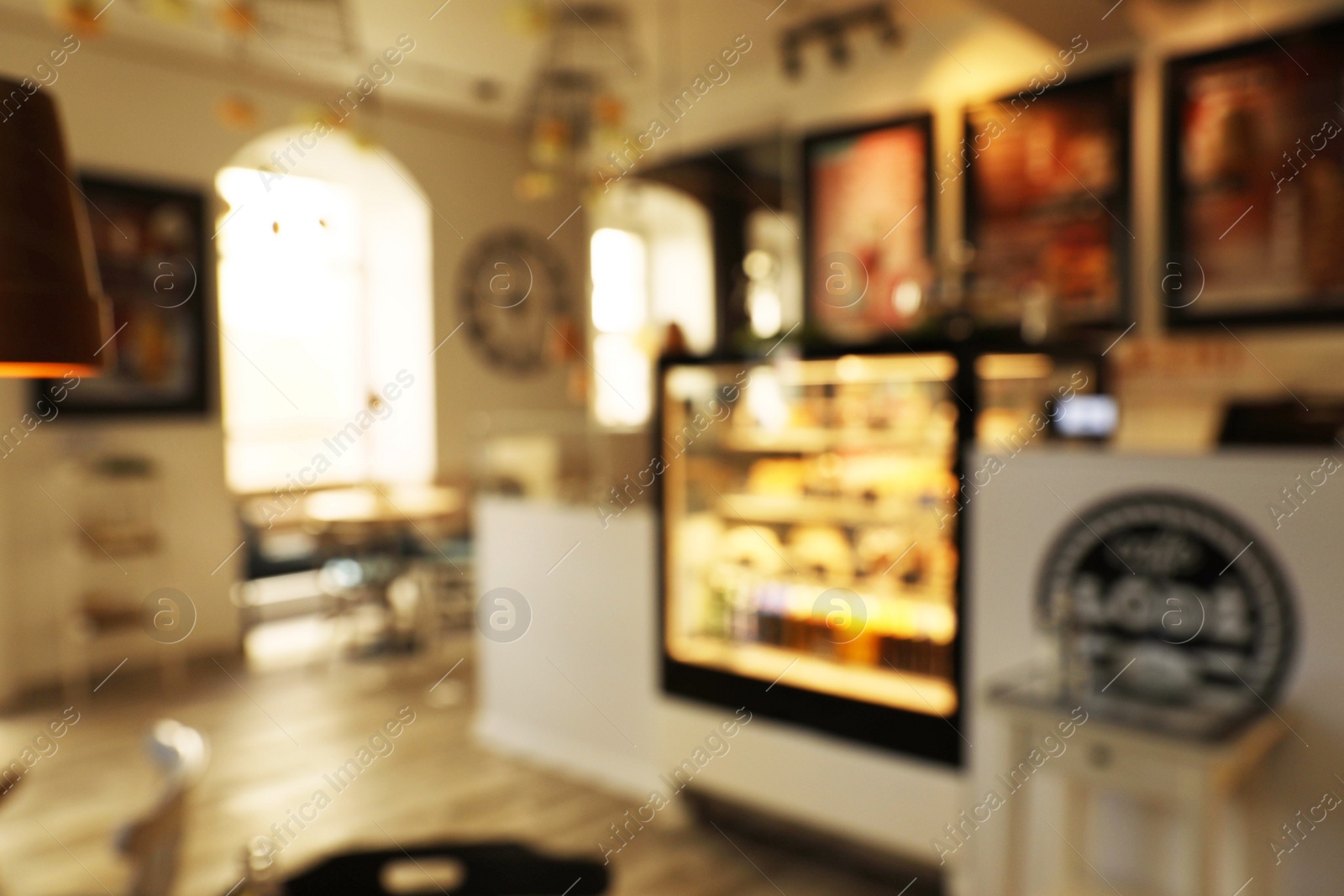 Photo of Blurred view of stylish modern cafe interior