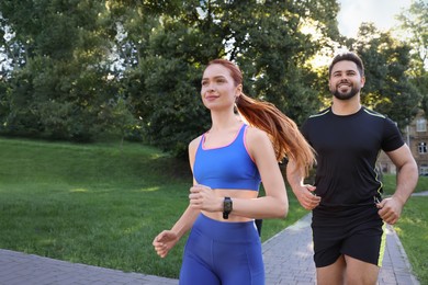 Group of people running in park. Active lifestyle