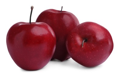 Fresh ripe red apples on white background