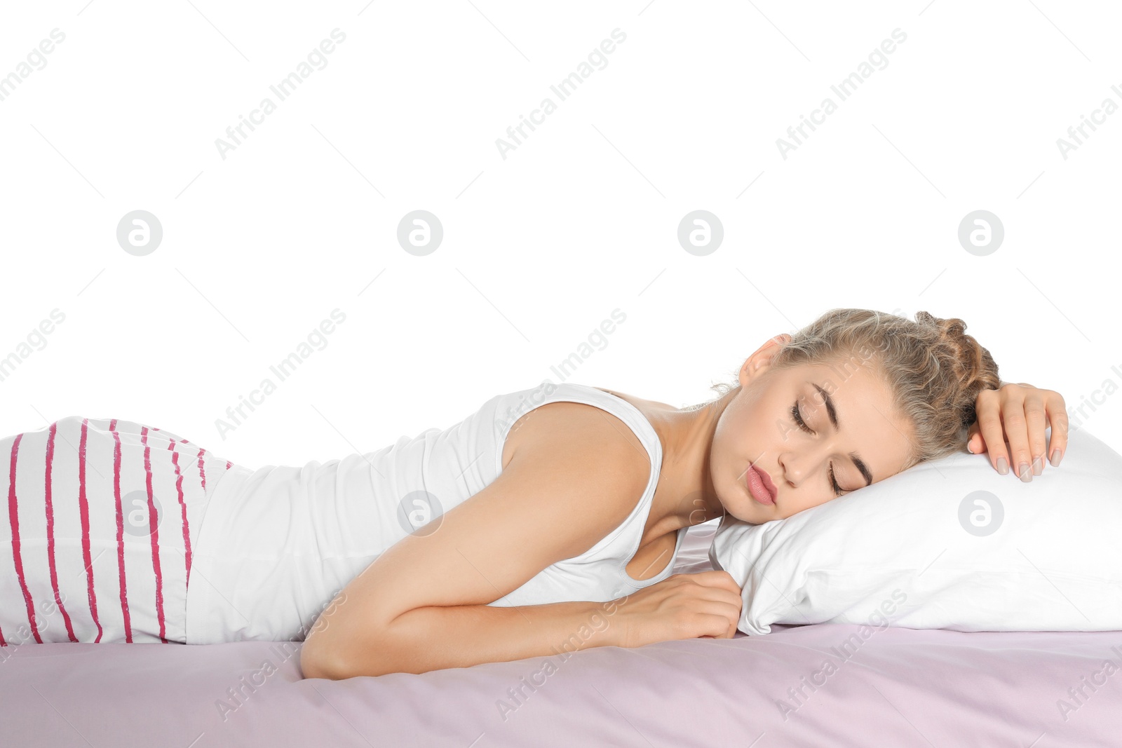 Photo of Beautiful woman sleeping with comfortable pillow on bed against white background