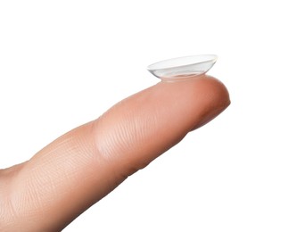 Photo of Woman holding contact lens on white background, closeup