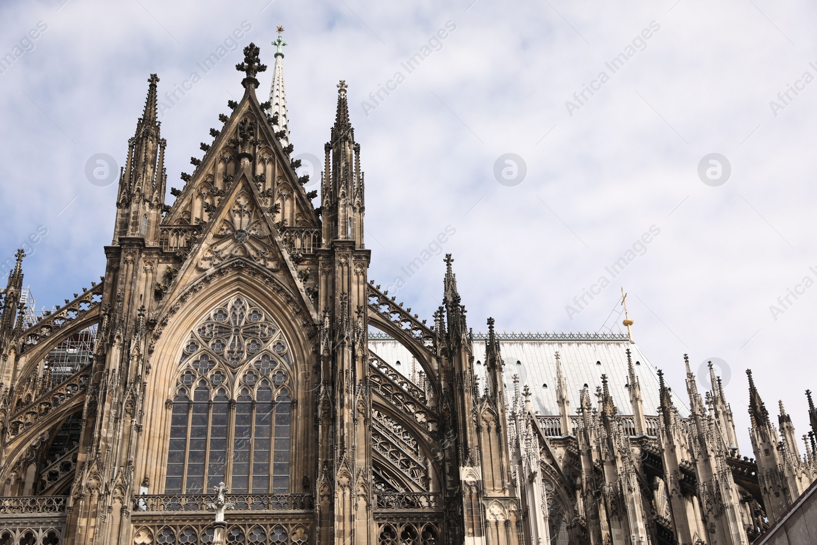 Photo of Cologne, Germany - August 28, 2022: Beautiful old gothic cathedral against blue sky