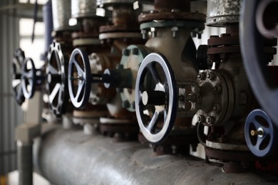 Pump control valves at modern granary, closeup view