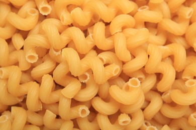 Photo of Raw cavatappi pasta as background, top view