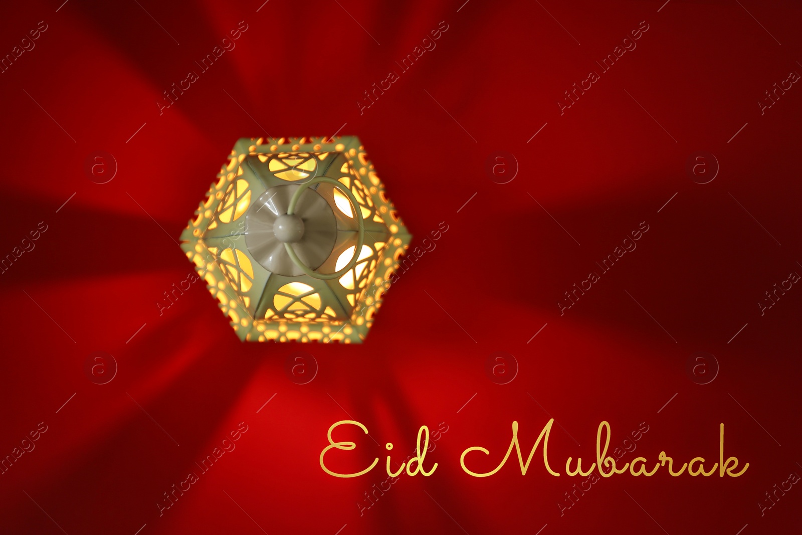 Image of Eid Mubarak greeting card. Arabic lantern on red background, top view