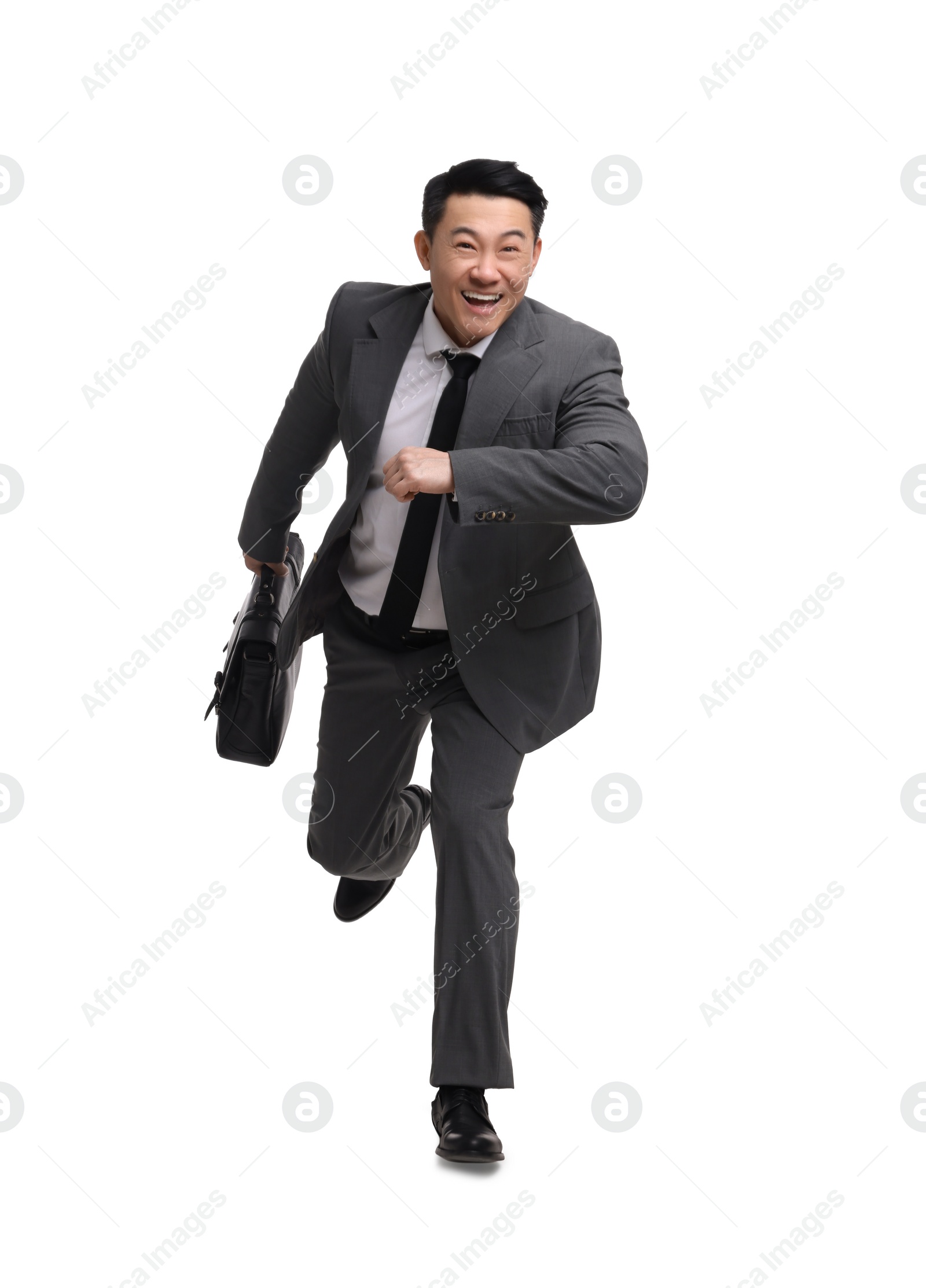 Photo of Businessman with briefcase running on white background